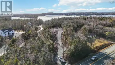 Welcome to 1936 Prospect Road, a rare south-facing lakefront lot offering approximately 2 acres of m...