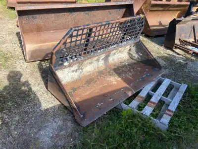 Welcome to Stoneage Equipment Selling this 68in., skid steer quick attach Cat bucket.