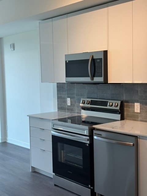 Luxury One Bedroom Plus Den 3