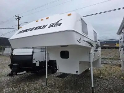Northern Lite Limited Edition 8-11EXLEDB truck camper highlights: Queen Bed Dry Bath USB Charging St...