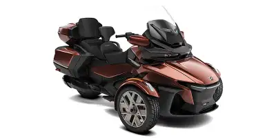 NEW 2026 Can-Am RT Sea-to-Sky in mars red metallic. This 2-up touring model features the Rotax 1330...