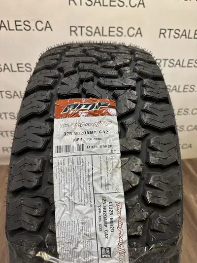 Set of four NEW 325/60/20 LT Amp Terrain Pro. All weather tires 20 inch -- ( close in size to a 35x1...
