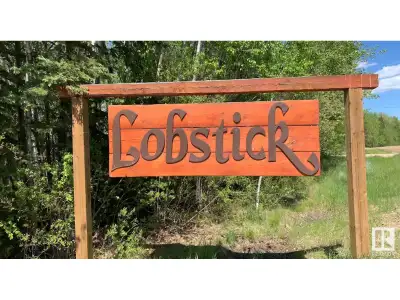 Nestled in the serene surroundings of Lobstick Resort, this stunning .75 acre parcel of land offers...