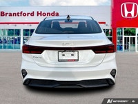 The 2024 Kia Forte EX, finished in striking Snow White Pearl, instantly elevates your daily commute... (image 4)