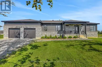 Welcome to this exceptional custom-built bungalow, nestled on a generous estate lot in the prestigio...