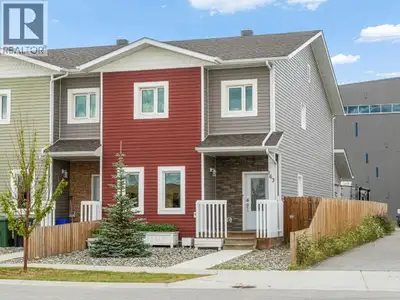 End-unit advantage. Family-sized function. No condo fees. This quality-built Super Green townhouse d...