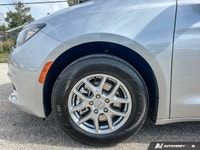 This Chrysler Grand Caravan has a strong Regular Unleaded V-6 3.6 L/220 engine powering this Automat... (image 8)