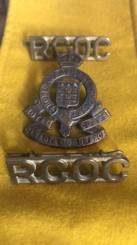 World War II Royal Canadian Ordinance Corp Cap Badge and titles.