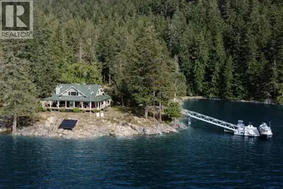 One of the most iconic low-bank waterfront properties in B.C. Situated in Telescope Passage on Nelso...
