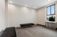 Fully renovated spacious suites with kitchen featuring chrome accents, laminate countertops, new ove... (image 8)