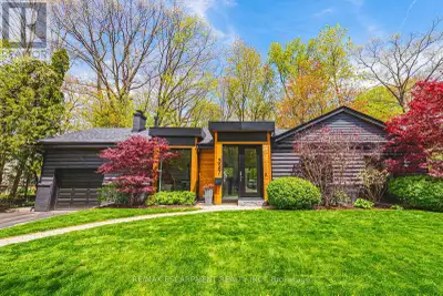 COMPLETELY REIMAGINED FROM TOP TO BOTTOM - INSIDE AND OUT! This exceptional bungalow is set on a cov...