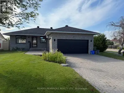 Surprisingly Spacious Executive Bungalow main floor with 2 Bed, 2 Bath with access and use of the re...