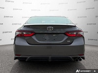 This 2023 Toyota Camry SE offers a compelling blend of style, comfort, and technology. Its sleek gra... (image 5)