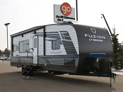 The 2026 Impact 2813 is a toy hauler travel trailer designed to combine comfortable living space wit...