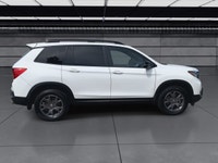 Experience sophistication and performance with the 2023 Honda Passport Sport AWD. Dressed in a strik... (image 8)