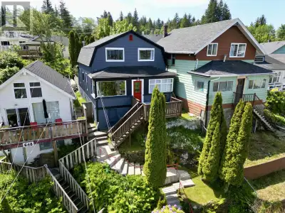 * PREC - Personal Real Estate Corporation. This charming home is set back from the road and elevated...