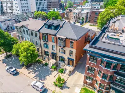 Welcome to 21 Bold Street! Historic brownstone end-unit commercial property rarely offered in the hi...