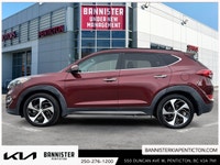 Experience the 2016 Hyundai Tucson Ultimate in its striking red exterior, offering the confidence of... (image 4)