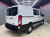 The 2024 Ford Transit Cargo Van T-250 130 Low Rf 9070 GVWR AWD in pristine white is a formidable veh... (image 1)