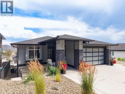 This tastefully designed 5 bedroom home is located in the desirable Tallus Ridge community. The brig...