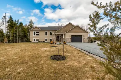 Welcome to this stunning custom split-entry bungalow, expertly crafted by ReDesigns Construction. Sh...