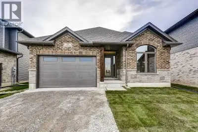 BETTER THAN NEW! Built in 2023 bungalow loaded with upgrades. This home is way bigger than appears;...