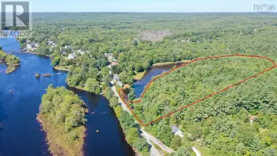 Charming Gothic Revival Home on 4 Acres with Approx 1500 Feet of Waterfront. Step into history and t...