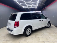 The 2019 Dodge Grand Caravan Canada Value Package in pristine white is the perfect blend of practica... (image 4)