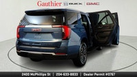 The 2025 GMC Yukon Elevation combines bold styling, spacious versatility and powerful performance in... (image 8)