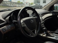 The 2011 Acura MDX Elite Package is a standout premium midsize luxury SUV that brings an aggressive,... (image 4)