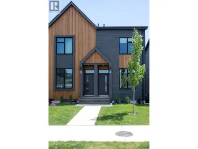 Experience the perfect blend of comfort, style, and convenience in this 2024 built corner townhome a...