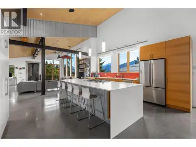 Perched high in the desirable Pemberton Benchlands, this contemporary single-family home offers brea...