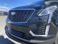 The 2024 Cadillac XT5 Standard AWD, finished in Stellar Black Metallic, combines refined styling, ad... (image 2)