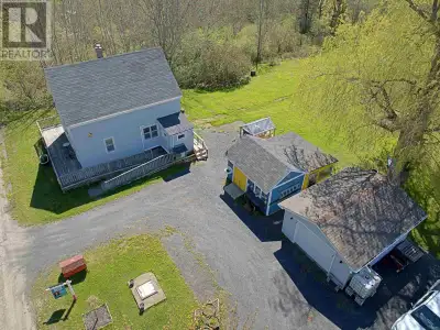 Welcome to 51 Block Wharf Road, and step back in time with this beautifully maintained 1.5-story hom...