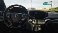 Experience the 2022 Honda Ridgeline Black Edition, where luxury meets functionality. Enjoy keyless e... (image 6)