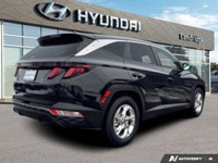 The *2023 Hyundai Tucson Essential* delivers the bold, futuristic design of the Tucson lineup in a h... (image 4)