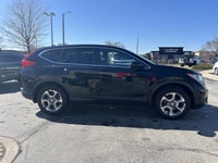 Elevate every journey with this striking Crystal Black Pearl 2017 Honda CR-V EX-L. Renowned for its... (image 3)