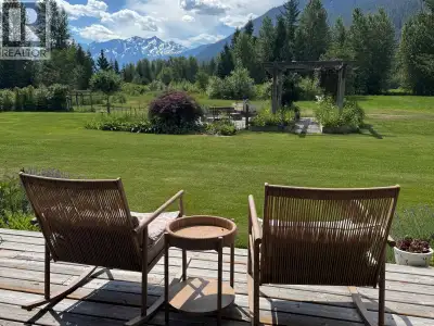 Set on a sun-drenched, well-managed 5 acres with stunning Mt. Currie views, this 3-bedroom and den f...