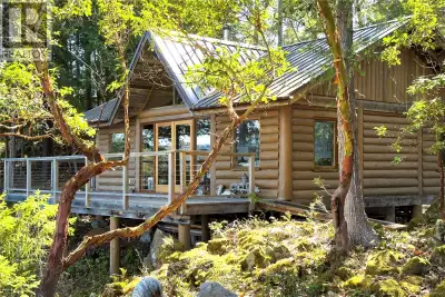 Escape to your own private retreat on Cortes Island with this charming one-bedroom log cabin set on...
