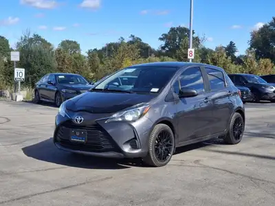 Come see this certified 2019 Toyota Yaris Hatchback LE | 5-Speed Manual | A/C | Heated Seats | Rear...