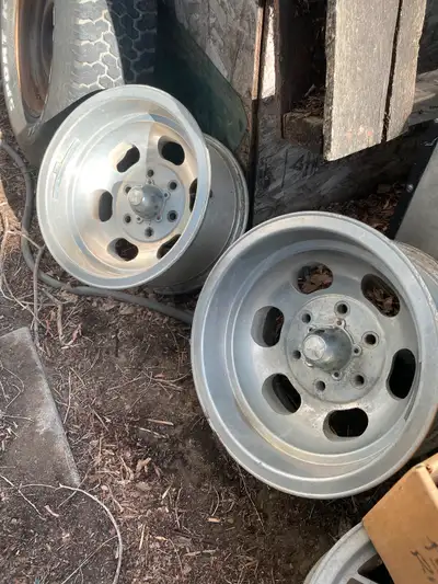 Two only fits older GM 6 bolt pattern 15x8.5 bore size 3.5 $500. Also have a set of 15x10 for $600.