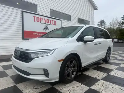 A spacious family minivan with comfortable seating, advanced safety features, and practical convenie...