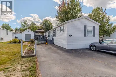 This charming 2-bedroom, 2-bathroom mini home (1992) has been lovingly maintained and will be ready...