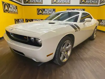 Unleash classic American muscle with this 2009 Dodge Challenger R/T, now available at Auto Avenue Ai...