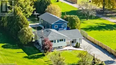Come see me now! Set on a picturesque half-acre in rural Ancaster, this thoughtfully updated side-sp...