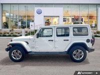 Unleash the spirit of adventure with the 2020 Jeep Wrangler Unlimited Sahara in striking Bright Whit... (image 1)