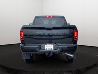 This Ram 2500 delivers a ESL 6.4L V8 HEMI(R) HD engine engine powering this Automatic transmission.... (image 4)