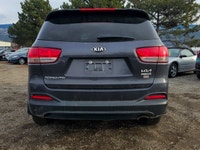 Introducing the stylish 2017 Kia Sorento LX in an elegant Black finish, paired with a capable AWD dr... (image 4)