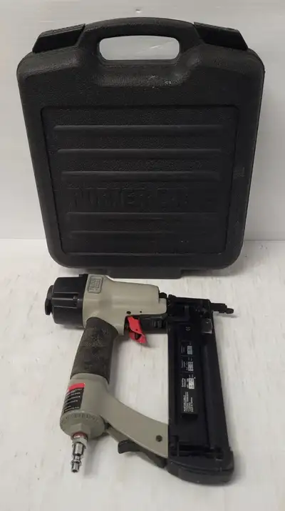 In good working condition with scuffs and scratches. Porter Cable 18GA Brad Nailer Model: BN200A Com...