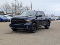 The pre-owned 2021 Ram 1500 Classic Express Crew Cab in Patriot Blue Pearl with a Black and Diesel G... (image 1)